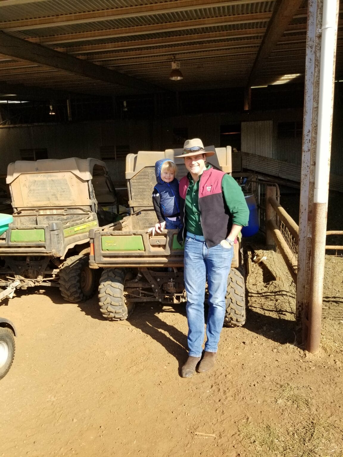 AgriWebb chairman and co-founder, Justin Webb with his young son, at home on Eddington Station in Victoria's remote Western District.