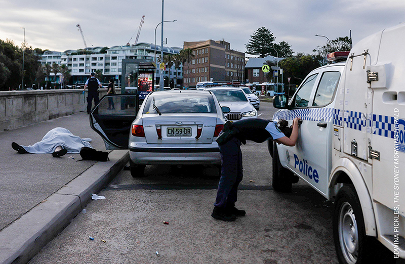 Title: Bondi Beach Terror Attack Credit: &copy; Edwina Pickles, The Sydney Morning HeraldCaption: An overwhelmed police officer leans over near the bodies of Boris (69) and Sofia (61) Gurman. During the Bondi Beach Terror Attack, the couple were killed while attempting to disarm one of the shooters. Sydney, Australia, 14 December 2025.Story: During Bondi Beach&rsquo;s 'Chanukah by the Sea,' a community event celebrating the Jewish holiday, two armed men motivated by ISIS ideology attacked participants, killing 15 people. The first victims were Boris (69) and Sofia (61) Gurman, a Ukrainian-Jewish couple who had migrated to Australia decades earlier. Dashcam footage revealed that Boris approached one of the attackers and successfully wrested a rifle away. Shortly after, Syrian-Australian shopkeeper Ahmed al-Ahmed charged the second gunman and disarmed him. In their struggles against the gunmen, al-Ahmed was shot twice and wounded, and the Gurmans were killed. According to authorities, these collective acts of defiance delayed the shooters and saved lives.Prime Minister Anthony Albanese called the mass shooting an antisemitic attack and the deadliest terrorist incident on Australian soil ever. The shooting has prompted a significant re-evaluation of public security and religious freedom protections in Australia.