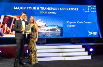 Nick Lester, the general manager of Captain Cook Cruises (SeaLink Marine and Tourism Sydney) receives the NSW Major Tour and Transport Operators Gold Award.